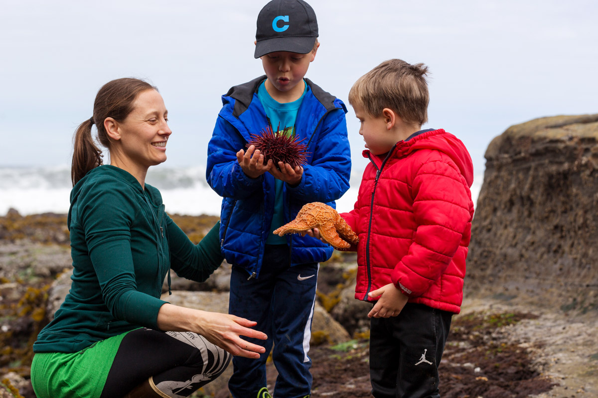 Doctor Sarah Gravem exploring tide pools with her kids